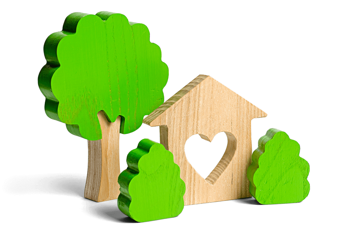 Carvings of trees and house with heart