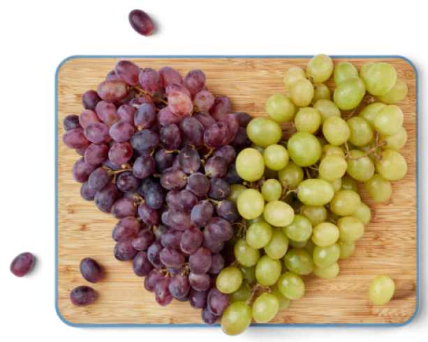 Grapes and cutting board