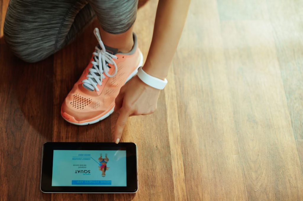 woman using technology for fitness