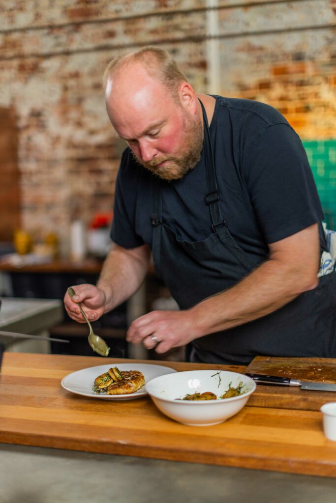 Chef Gord Kahle with Pork chop dish