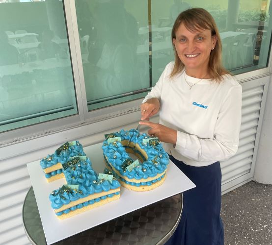Kleenheat General Manager Tanya Rybarczyk cutting 10th birthday cake